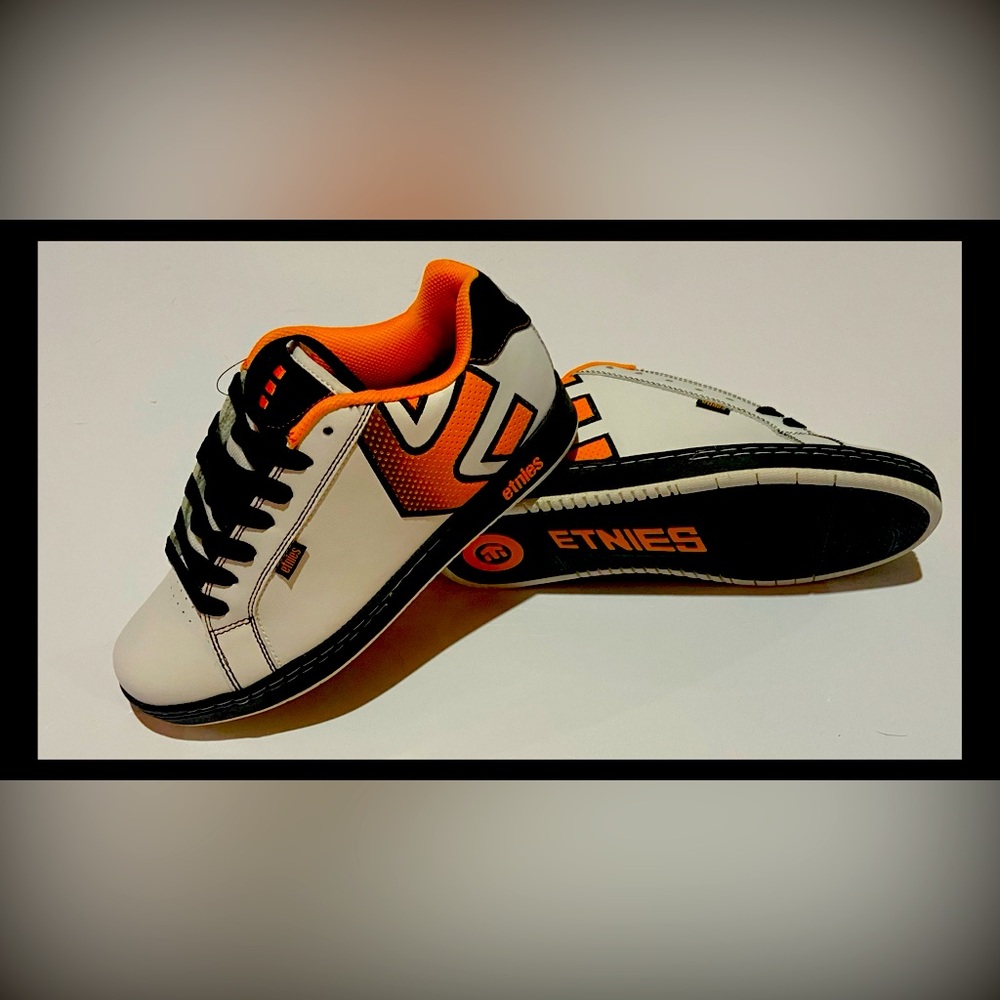 NEW/UNUSED!Etnies skater sneakers, white orange and black.Men’s US size 9.5